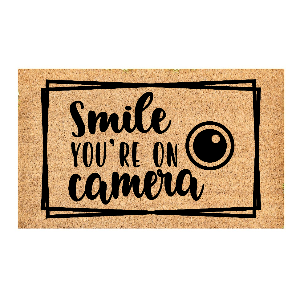 Smile you're on camera door mat