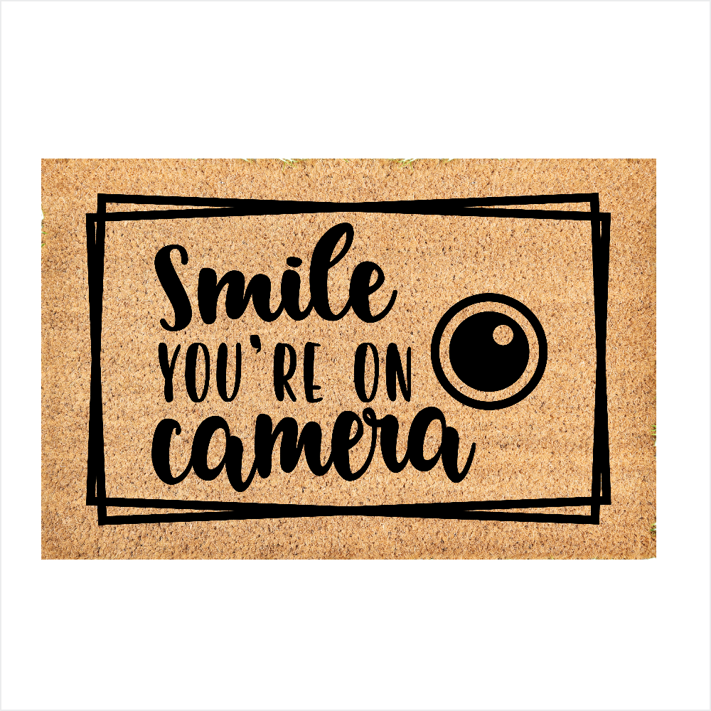 Smile you're on camera door mat