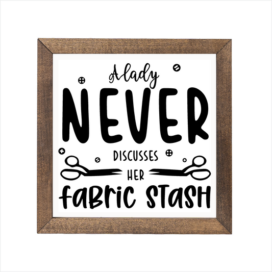 A lady never discusses her fabric stash sign, uv printed, wood frame