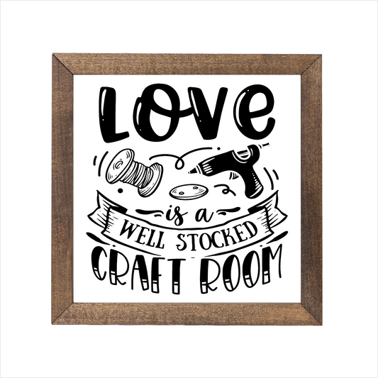 Love is a well stocked craft room sign, uv printed, wood frame